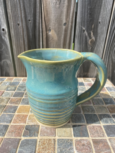 Small teal pitcher